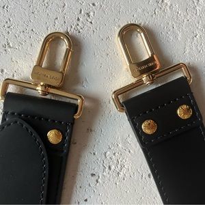 Black leather purse strap.